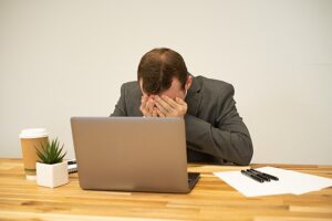 u338-Man_Stressed_At_Work